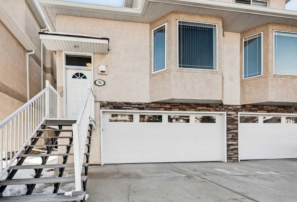 Photo of 71 Country Hills Gardens NW, Calgary, AB T3K 5G1 (MLS # A2298419)