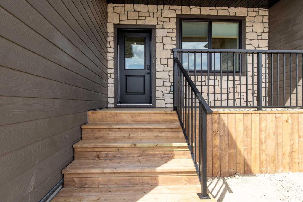 Photo of 306 Bridge Crossing Close, Raymond, AB T0K 2S0 (MLS # A2308874)