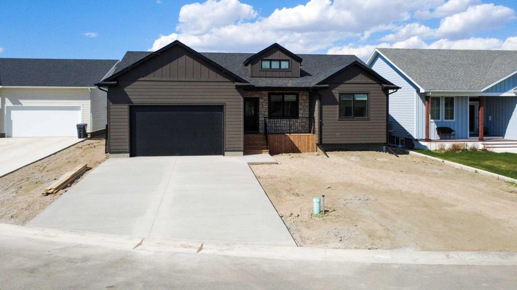 Photo of 306 Bridge Crossing Close, Raymond, AB T0K 2S0 (MLS # A2308874)