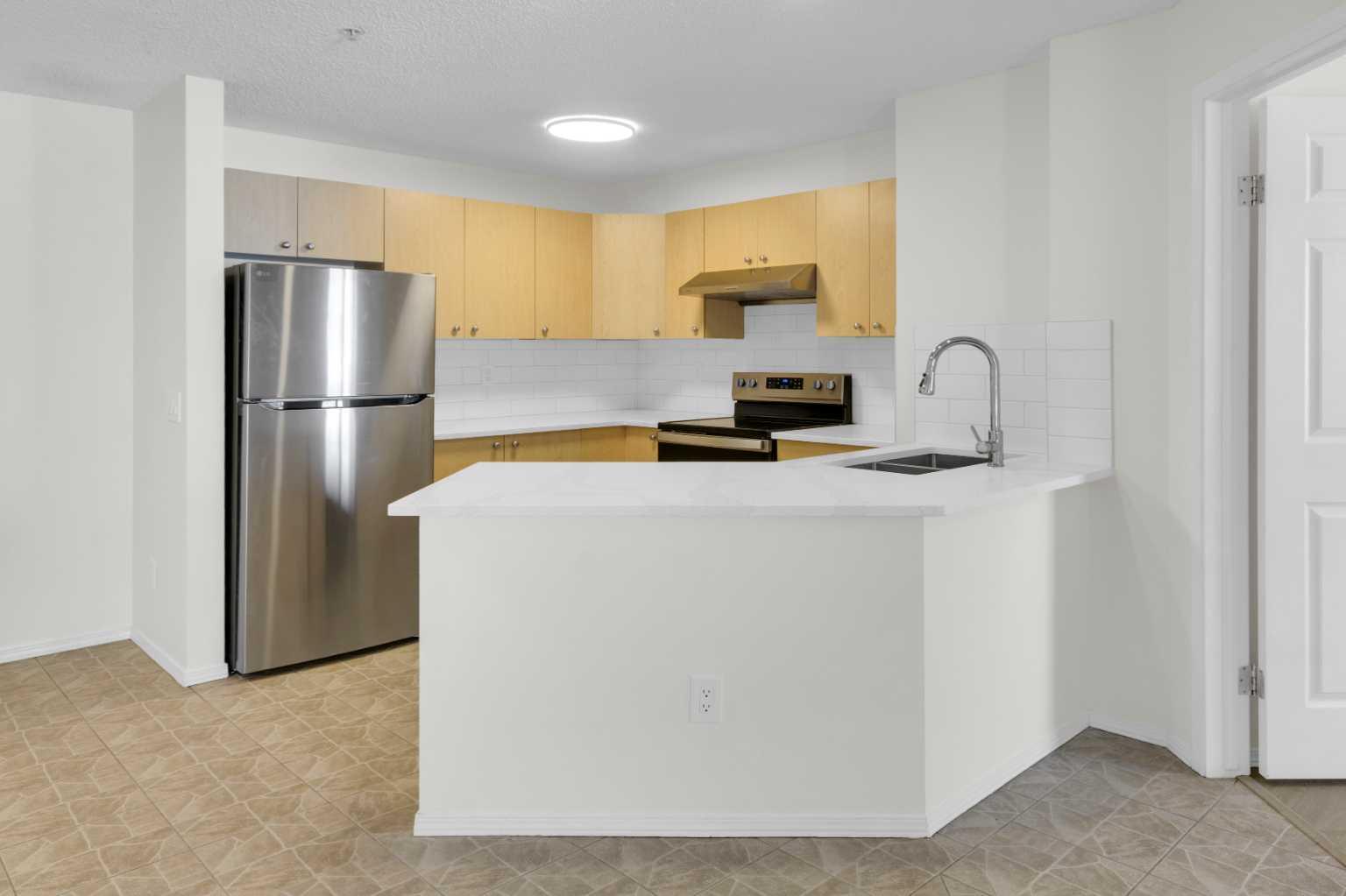 16 Country Village Bay NE 104