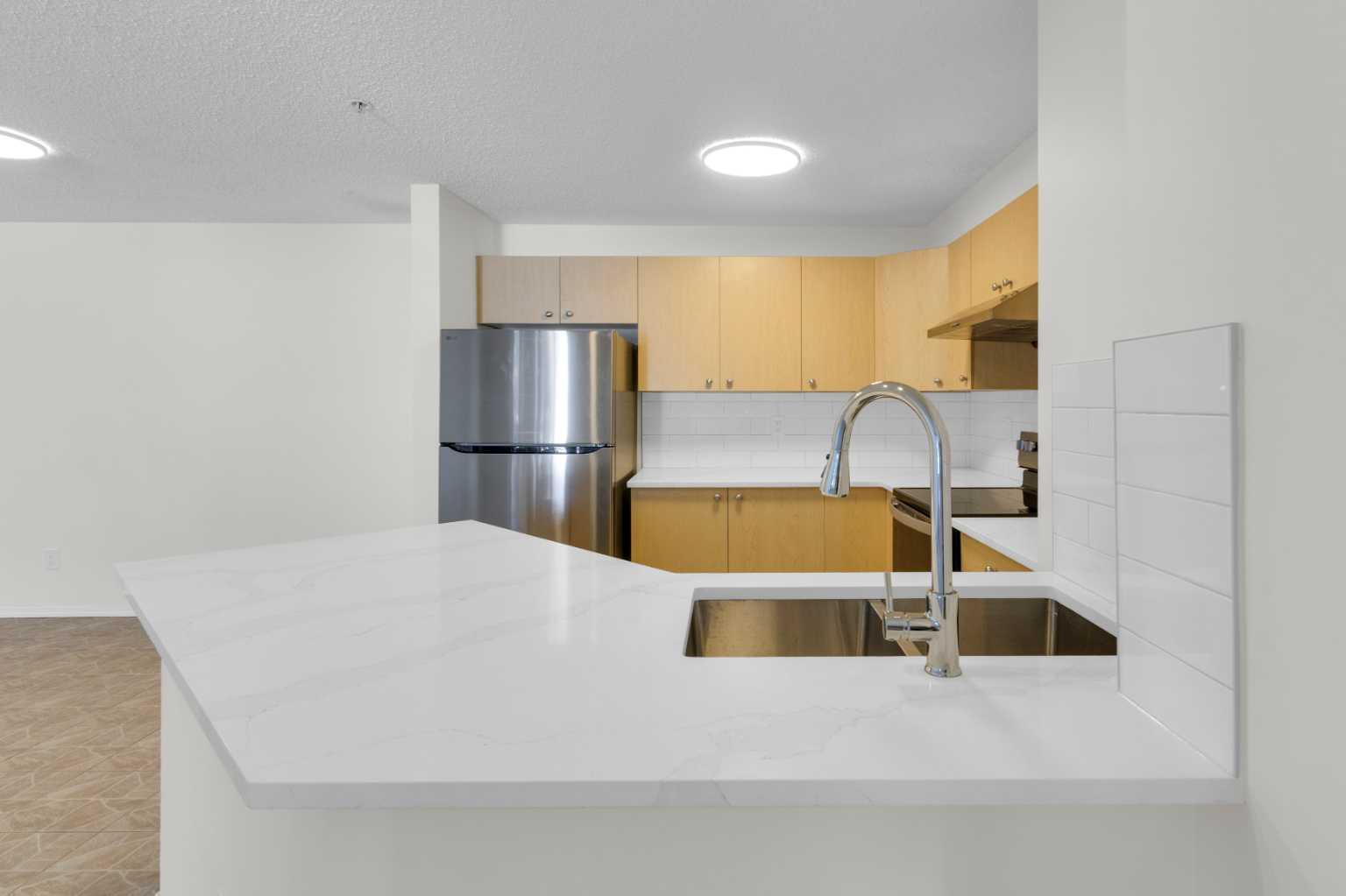 16 Country Village Bay NE 104