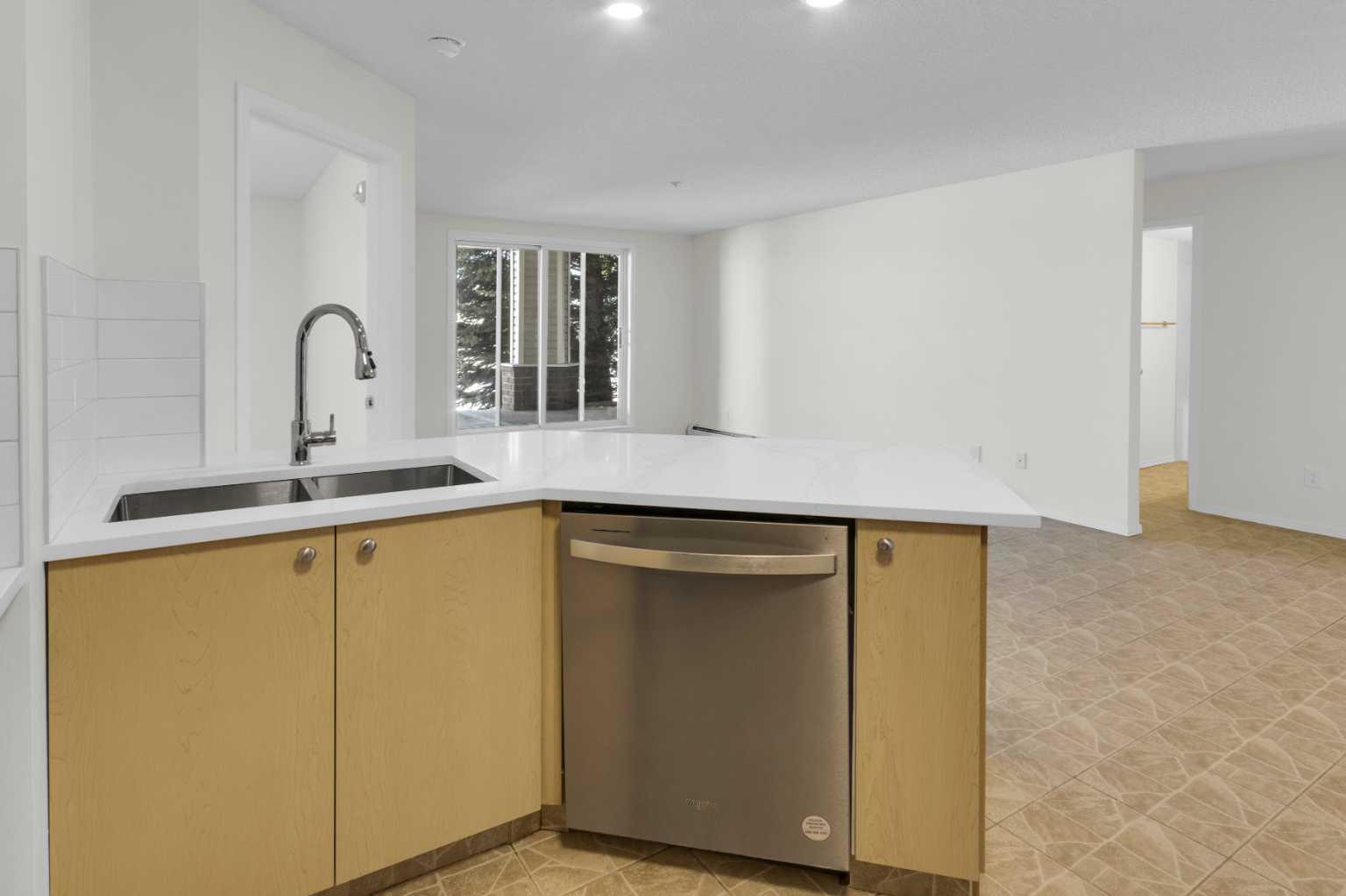 16 Country Village Bay NE 104