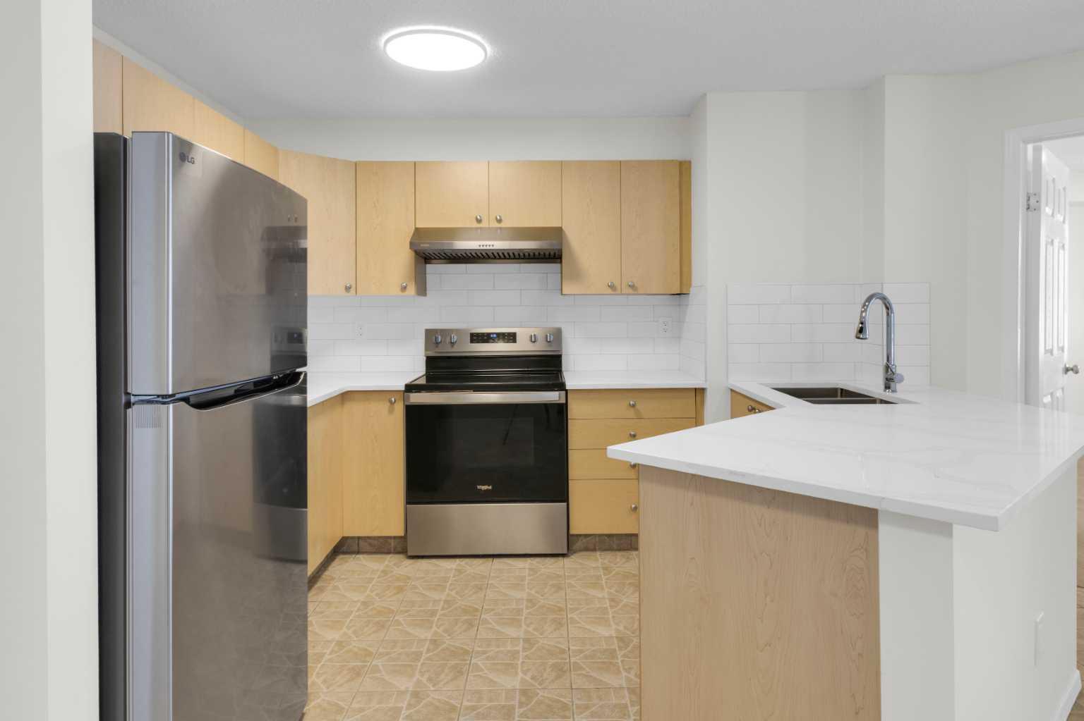 16 Country Village Bay NE 104