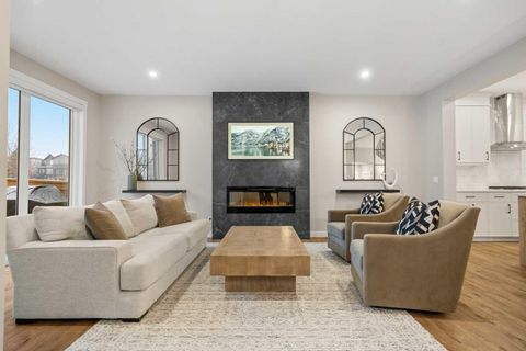 Photo of 135 Silver Spruce Grove SW, Calgary, AB T2X 5M1 (MLS # A2287454)