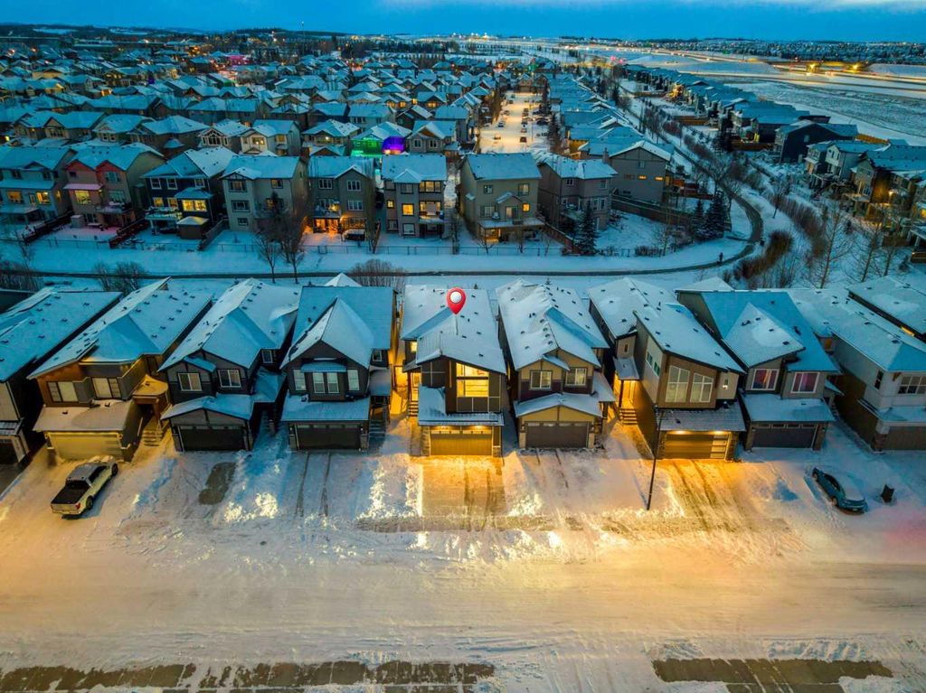 Photo of 135 Silver Spruce Grove SW, Calgary, AB T2X 5M1 (MLS # A2287454)