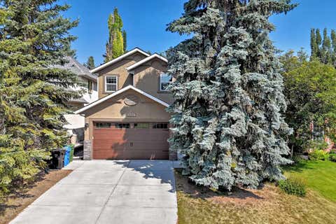 Photo of 1574 Evergreen Drive SW, Calgary, AB T2Y 3B7 (MLS # A2333043)