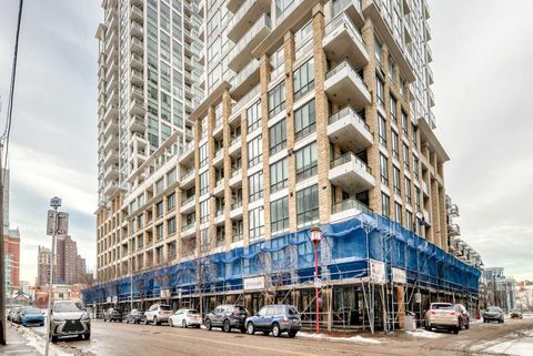 Photo of 222 RIVERFRONT Avenue SW #322, Calgary, AB T2P 0X2 (MLS # A2275149)