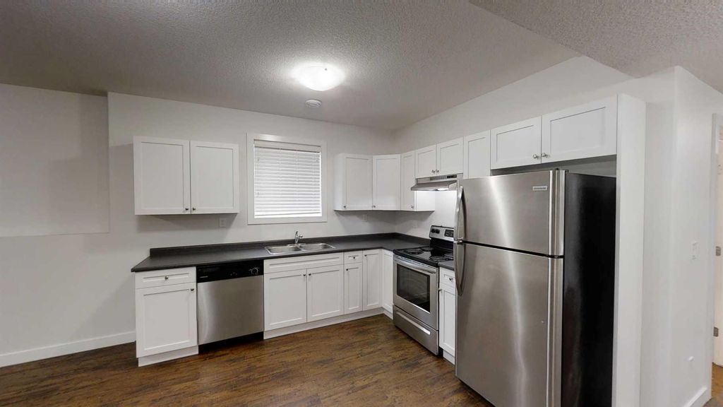 Photo of 9717 112 Avenue #B, Clairmont, AB T8X 5C2 (MLS # A2328811)