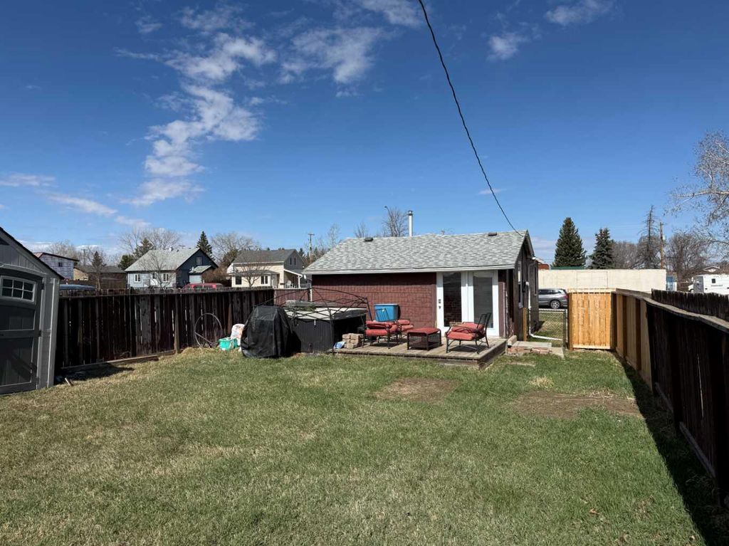 Photo of 209 1 Street N, Vulcan, AB T0L 2B0 (MLS # A2305991)