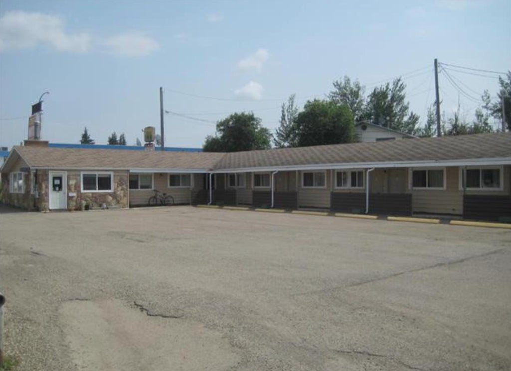 Photo of 504 &amp; 506 Main Street, Manning, AB T0H 2M0 (MLS # A2342680)