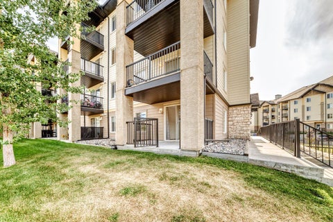 Photo of 304 Mackenzie Way SW #8101, Airdrie, AB T4B 3H8 (MLS # A2341516)