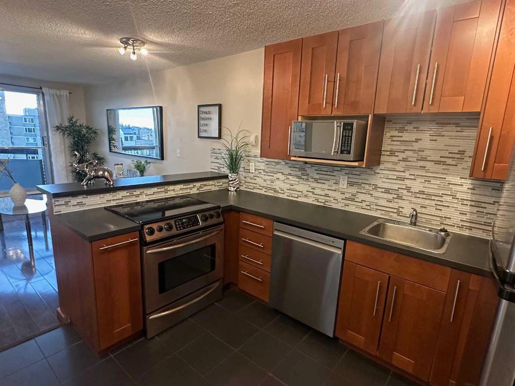 Photo of 340 14 Avenue SW #511, Calgary, AB T2R 1H4 (MLS # A2299377)