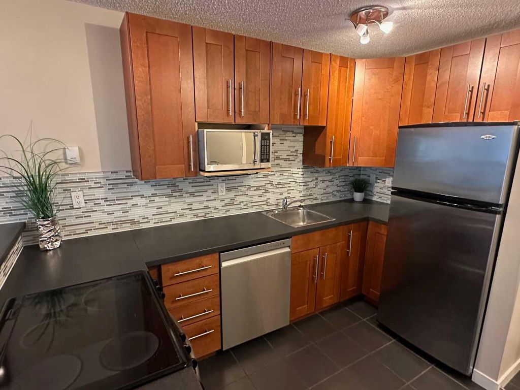 Photo of 340 14 Avenue SW #511, Calgary, AB T2R 1H4 (MLS # A2299377)