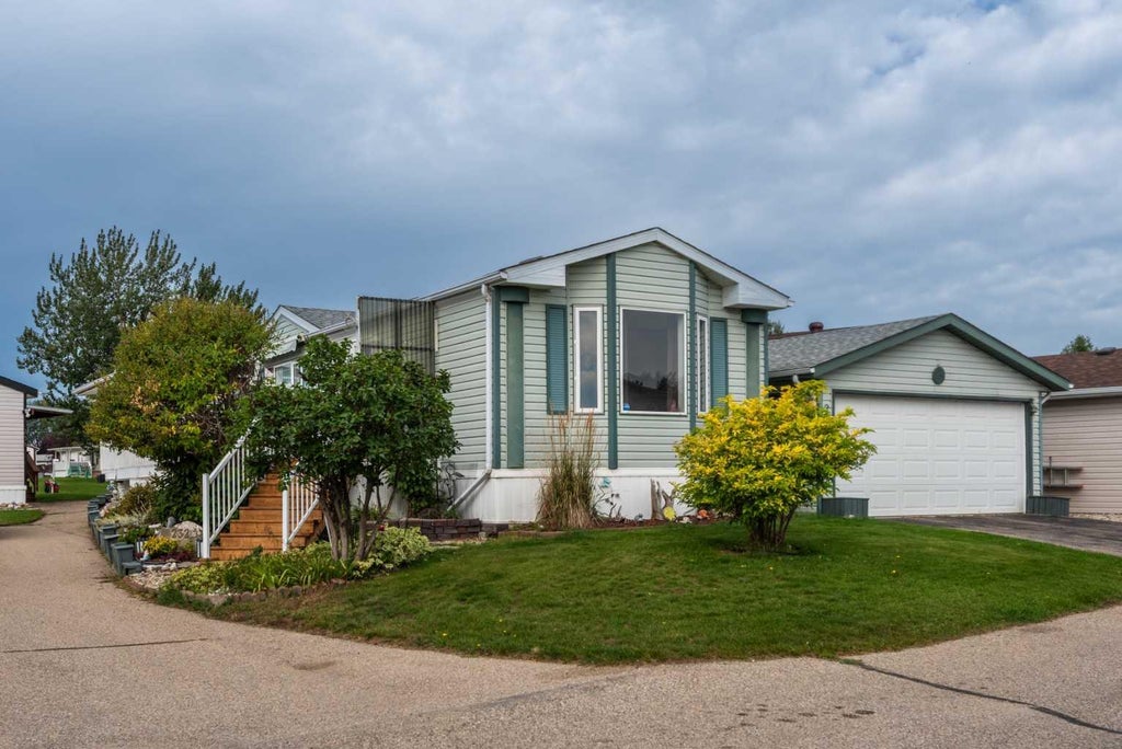 Photo of 232 Ranchwood Lane Ln, Strathmore, AB T1P 1M8 (MLS # A2327530)