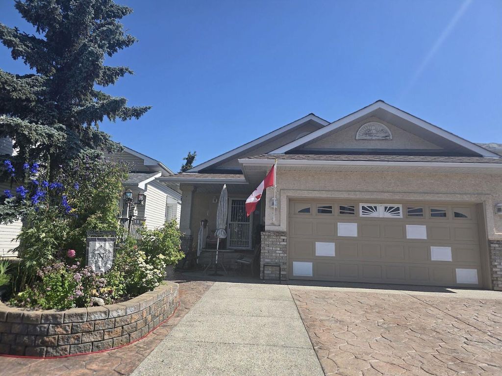 Photo of 180 Hidden Vale Close NW, Calgary, AB T3A 5C7 (MLS # A2285850)