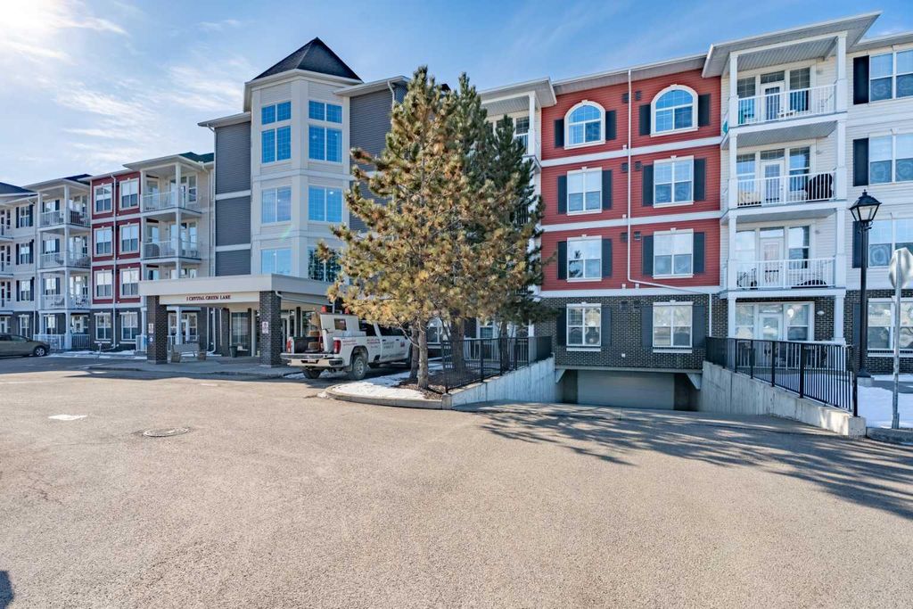 Photo of 1 Crystal Green Lane #410, Okotoks, AB T1S 0C5 (MLS # A2300391)