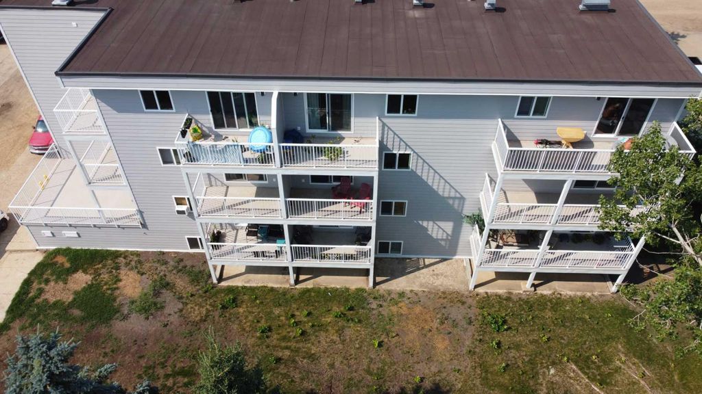 Photo of 5418 52 Street #405, Camrose, AB T4V 4A6 (MLS # A2288692)