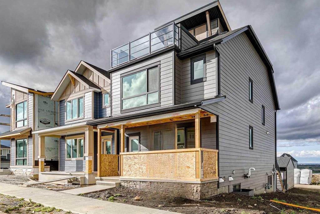Photo of 69 Bluerock Hill SW, Calgary, AB T2Y 0V7 (MLS # A2347105)