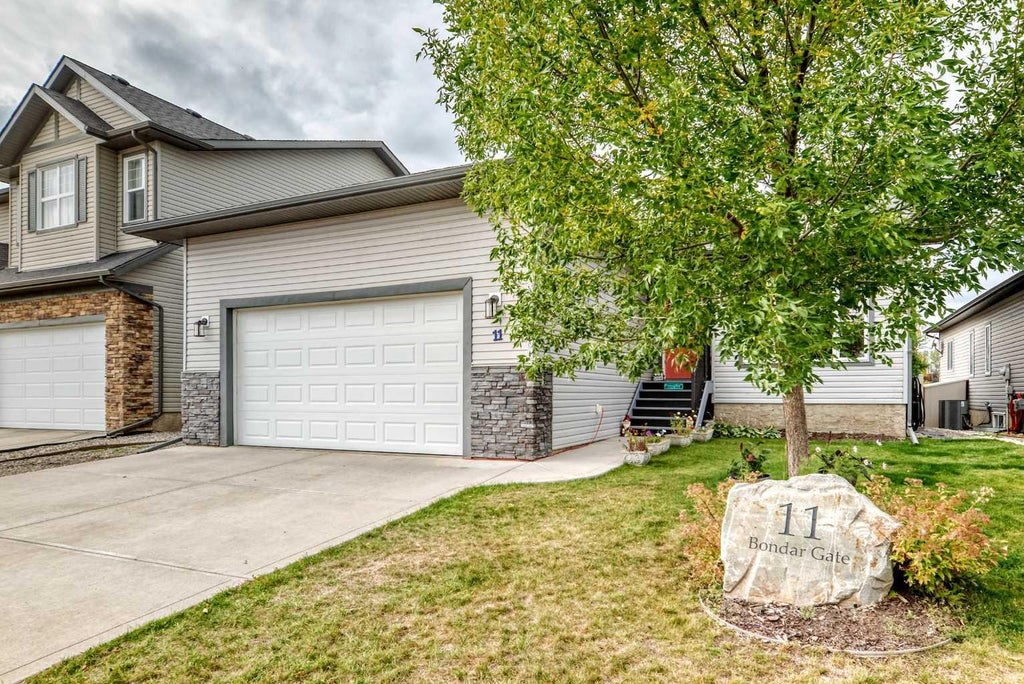 Photo of 11 Bondar Gate, Carstairs, AB T0M 0N0 (MLS # A2347975)