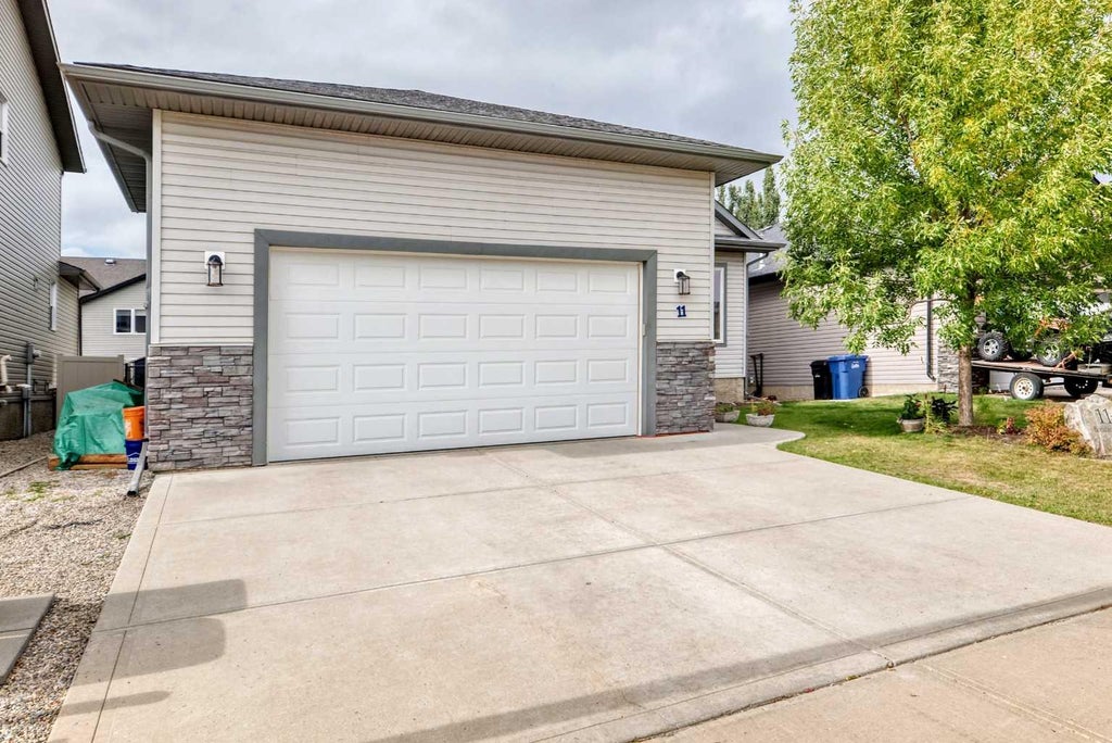 Photo of 11 Bondar Gate, Carstairs, AB T0M 0N0 (MLS # A2347975)
