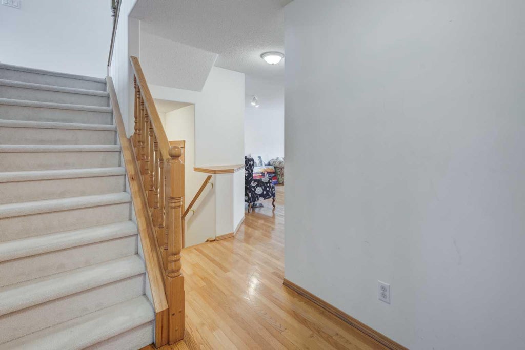 Photo of 142 Somerset Park SW, Calgary, AB T2Y 3H5 (MLS # A2342481)