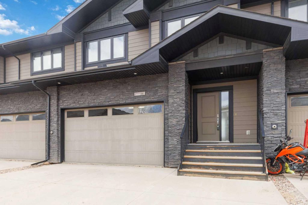 Photo of 208 SPARROWHAWK Drive #14, Fort McMurray, AB T9K 0Y8 (MLS # A2313812)