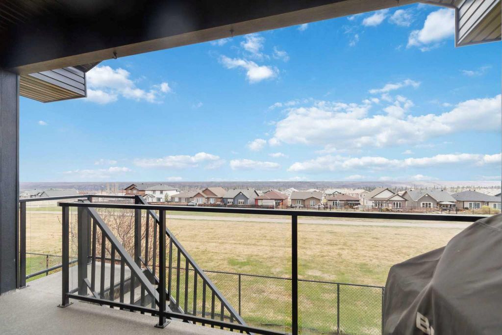 Photo of 208 SPARROWHAWK Drive #14, Fort McMurray, AB T9K 0Y8 (MLS # A2313812)
