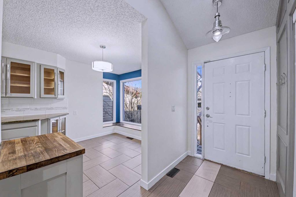Photo of 188 Bernard Drive NW, Calgary, AB T3K 2B7 (MLS # A2287043)