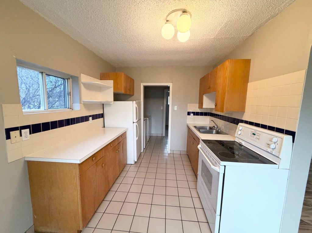 Photo of 9516 102 Avenue, Grande Prairie, AB T8V 0Z6 (MLS # A2310747)