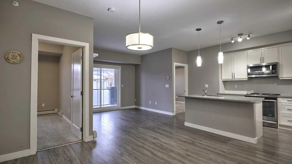 Photo of 150 Auburn Meadows Manor SE #410, Calgary, AB T3M 2S6 (MLS # A2271220)