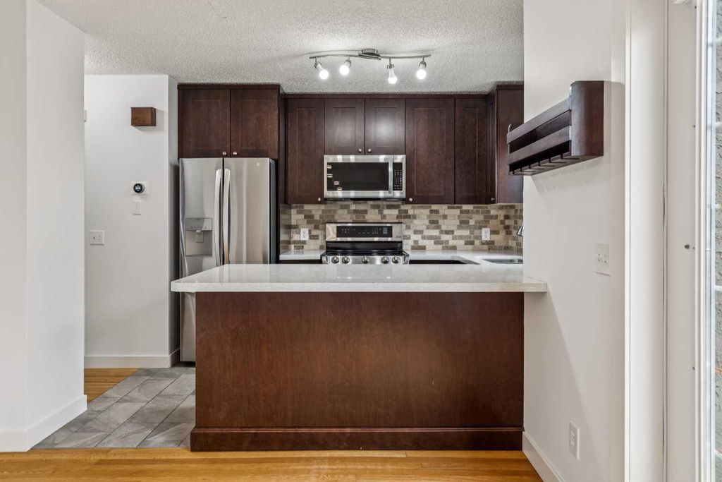 Photo of 1110 14 Avenue SW, Calgary, AB T2R 0P2 (MLS # A2304554)