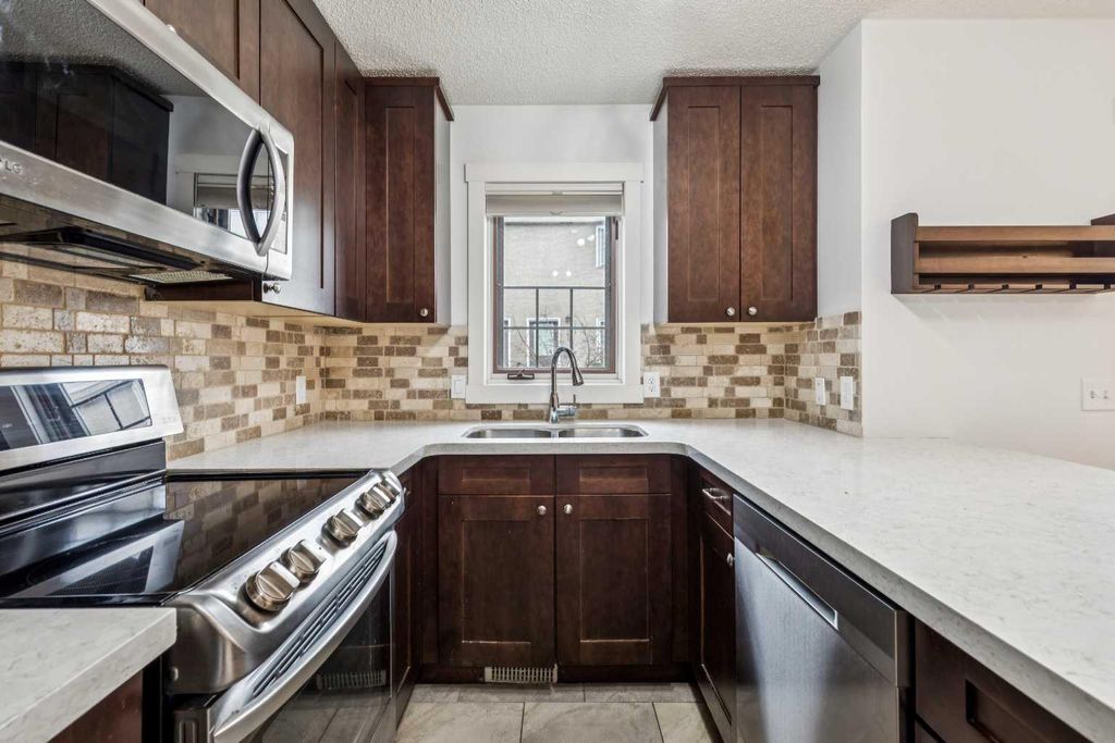 Photo of 1110 14 Avenue SW, Calgary, AB T2R 0P2 (MLS # A2304554)