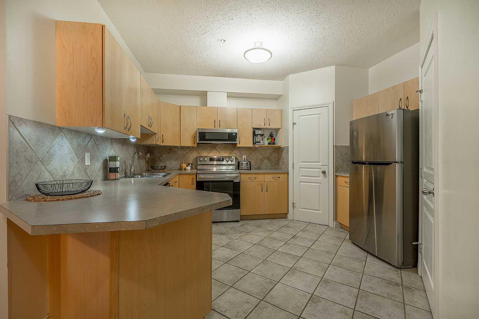 138 18 Avenue SE 202