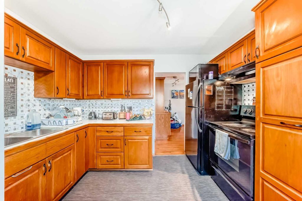 Photo of 1415 Rosehill Drive NW, Calgary, AB T2K 1M3 (MLS # A2295667)