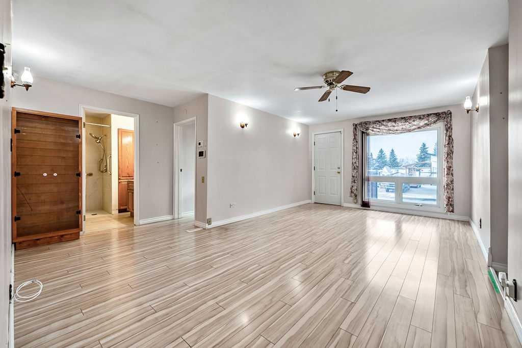 Photo of 210 Edgar Avenue NW, Diamond Valley, AB T0L 2A0 (MLS # A2354584)