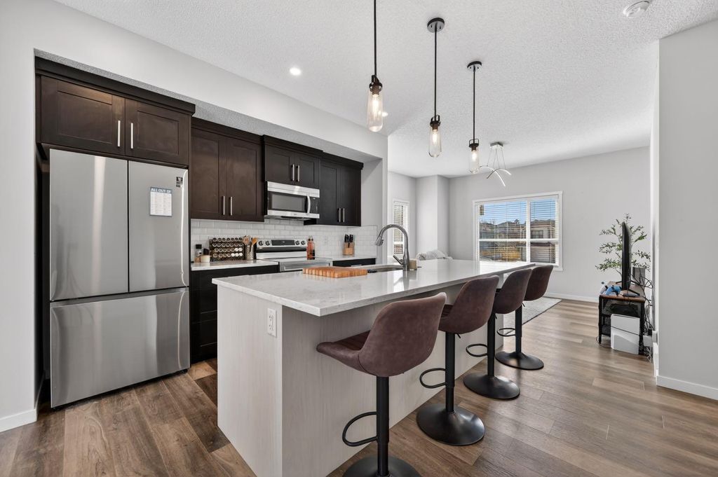 Photo of 220 HARVEST GROVE Walk, Calgary, AB T3K 2M1 (MLS # A2300936)