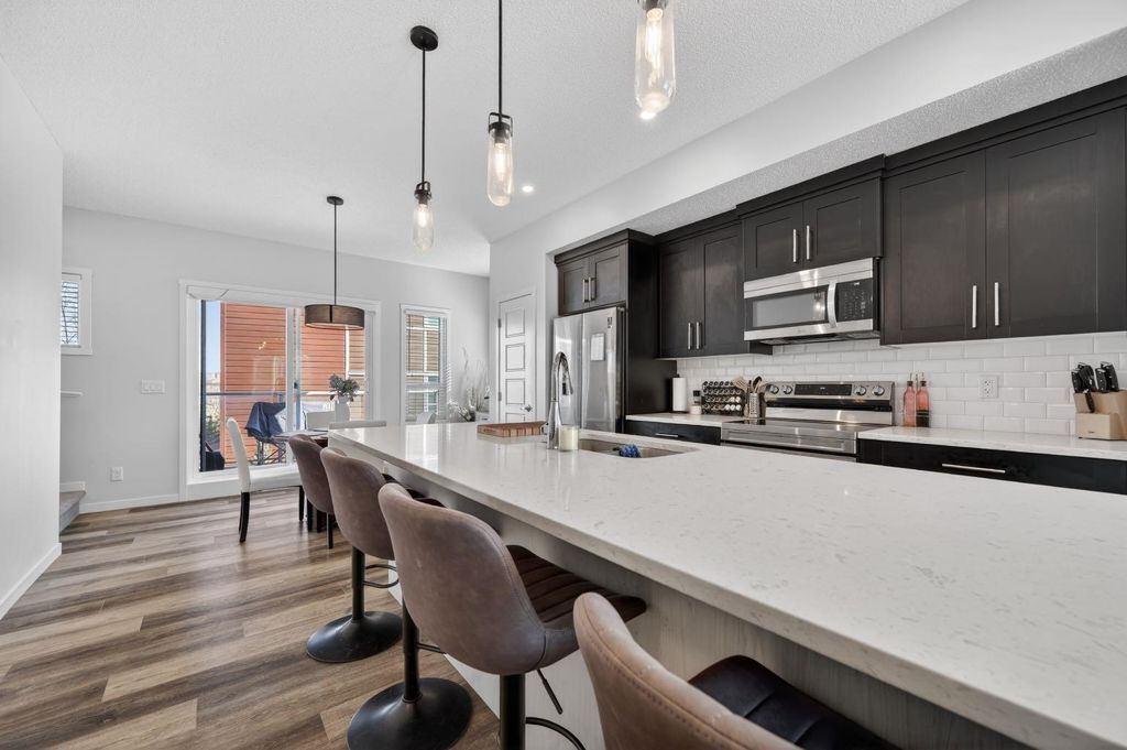 Photo of 220 HARVEST GROVE Walk, Calgary, AB T3K 2M1 (MLS # A2300936)