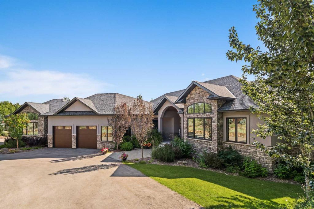 Photo of 25205D Bearspaw Place, Rural Rocky View County, AB T3R 1H5 (MLS # A2299712)