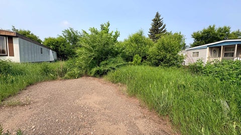 Photo of 1534 15 Street Crescent, Wainwright, AB T9W 1K8 (MLS # A2325291)
