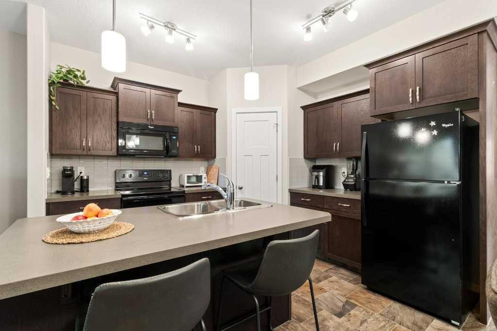 Photo of 5301 Windward Place #9, Sylvan Lake, AB T4S 0H5 (MLS # A2347535)