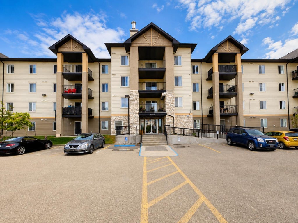 Photo of 304 Mackenzie Way SW #6101, Airdrie, AB T4B 3H4 (MLS # A2342311)
