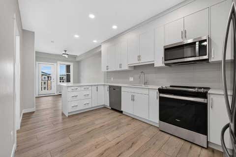Photo of 55 Wolf Hollow Crescent SE #411, Calgary, AB T2X 5K9 (MLS # A2331390)