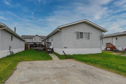 Photo of 9518 111 Avenue, Clairmont, AB T0H 0W3 (MLS # A2316651)