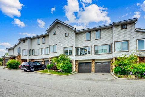 Photo of 219 Coachway Lane SW, Calgary, AB T3H 1A4 (MLS # A2293775)