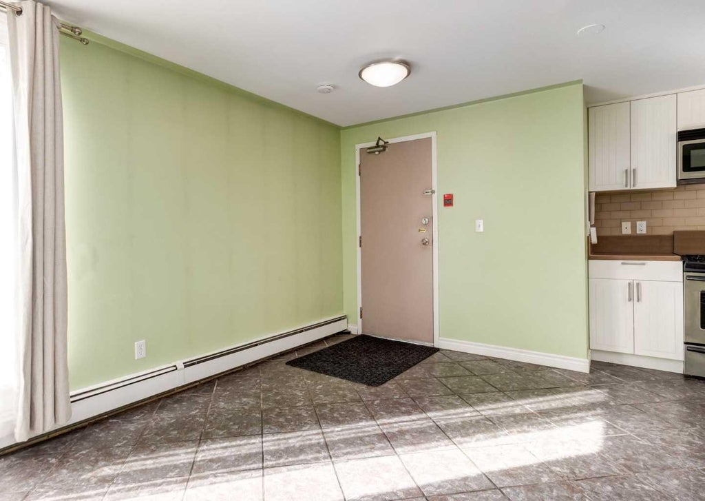 Photo of 128 15 Avenue SW #102, Calgary, AB T2R 0P5 (MLS # A2348019)