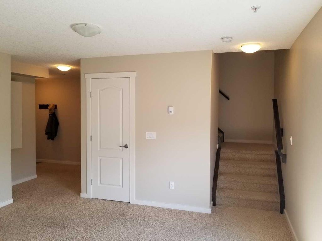 Photo of 141 Mountain Street #304, Cochrane, AB T4C 1Z5 (MLS # A2304296)