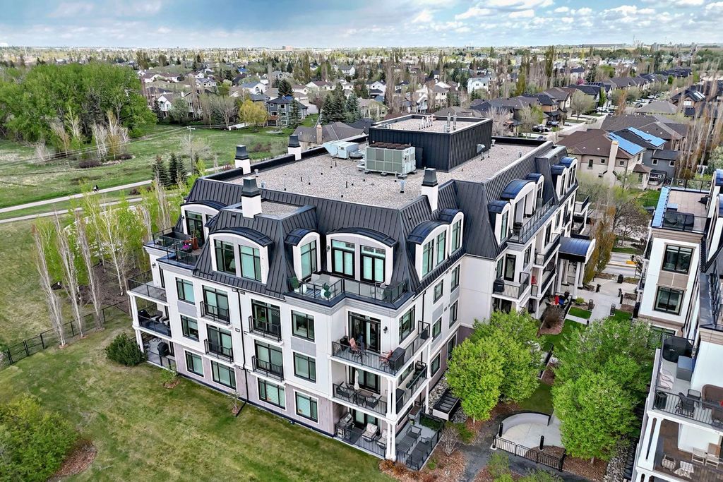 Photo of 121 Quarry Way SE #105, Calgary, AB T2C 5J1 (MLS # A2312306)