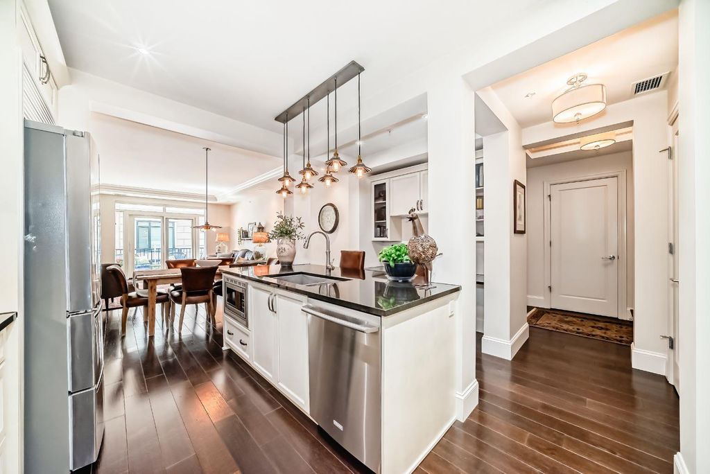 Photo of 121 Quarry Way SE #105, Calgary, AB T2C 5J1 (MLS # A2312306)