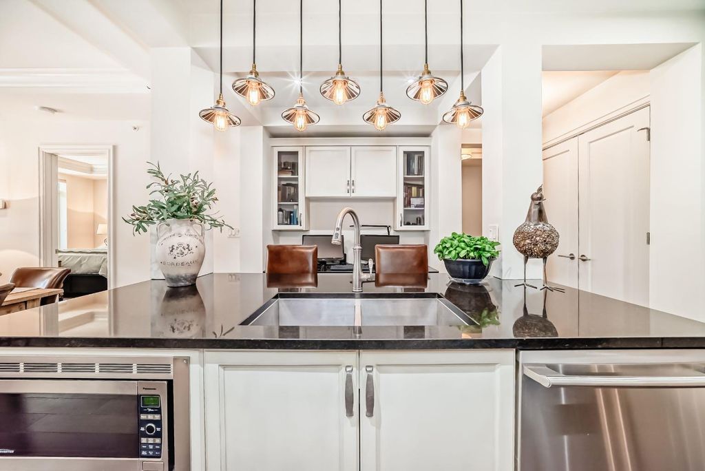 Photo of 121 Quarry Way SE #105, Calgary, AB T2C 5J1 (MLS # A2312306)