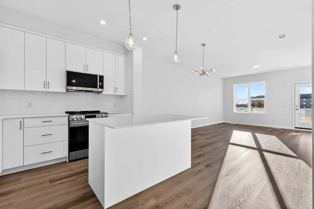 Photo of 12 Hotchkiss Parade SE, Calgary, AB T3S 0X5 (MLS # A2335561)